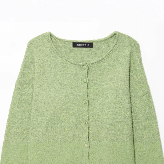 Round neck long sleeved single breasted solid color knitted sweater for women