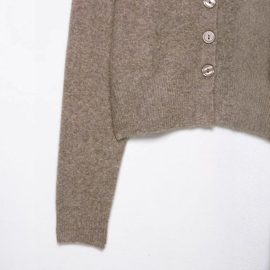 Round neck long sleeved single breasted solid color knitted sweater for women