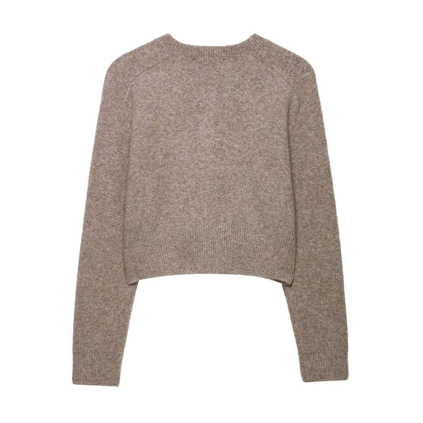 Round neck long sleeved single breasted solid color knitted sweater for women