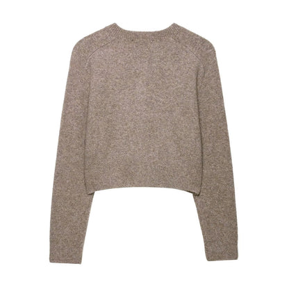 Round neck long sleeved single breasted solid color knitted sweater for women