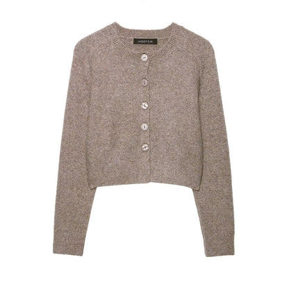 Round neck long sleeved single breasted solid color knitted sweater for women