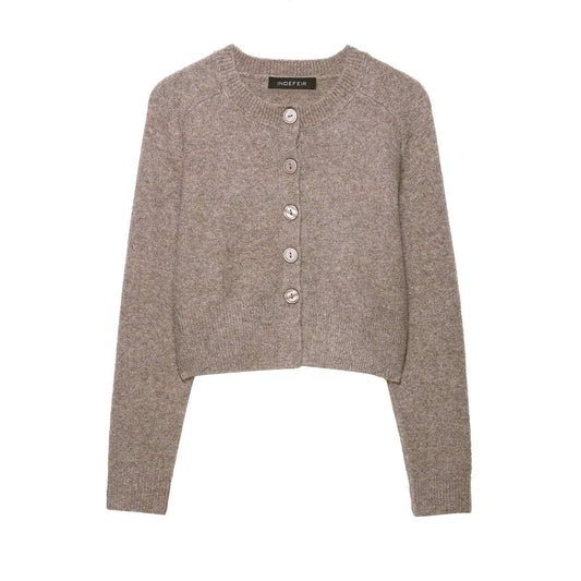 Round neck long sleeved single breasted solid color knitted sweater for women