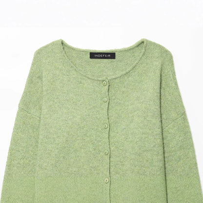 Round neck long sleeved single breasted solid color knitted sweater for women